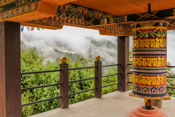 Buddhist prayer wheel in a temple in Bumthang, Bhutan