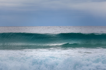 Big ocean wave - minimalist landscape, nothing but ocean and sky with copy space