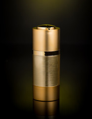 Beauty product bottle on black background.