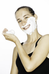 Young Woman Shaving Her Face