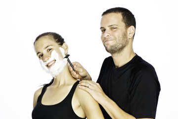 Man and Woman Shaving Her Face