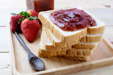 slice of bread with jam strawberry