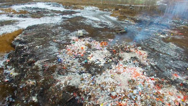 low span over a burning landfill