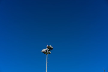 light pole and clear blue sky