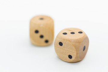 Dice on wood table using as find solution for business background