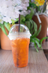 Iced tea with lemons and straw