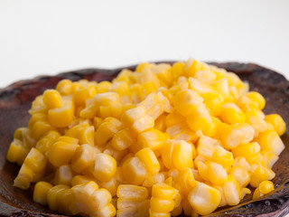 Grains of ripe corn isolated on white background.  .