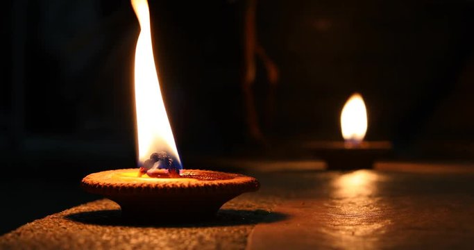 candle light flame fire on black background, traditional festival of Loi Krathong, Yee Peng Lanna Chiangmai, Thailand