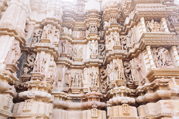 Ancient bas-relief at famous erotic temple in Khajuraho, India.