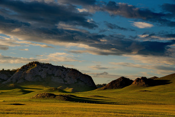 Sunset in the steppes of the Altai mountains