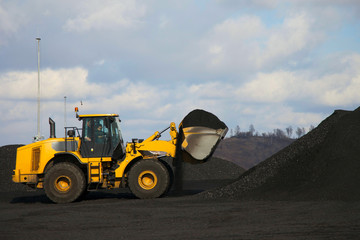 Wheel bulldozer while working on a coal mine.