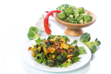 Brussels sprouts fried with beans close-up