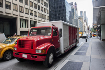 Fototapeta na wymiar Red Truck on new york street