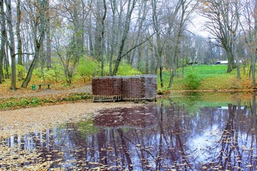 A bath woven from a willow twig on the estate of Leo Tolstoy in Yasnaya Polyana and a small pond.