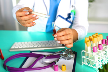 woman doctor at the table in the office