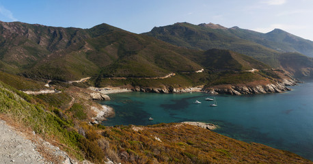 Fototapeta na wymiar Corsica, 28/08/2017: vista panoramica dell'Anse d'Aliso o Plage d'Alisu, una delle spiagge più remote del versante occidentale di Capo Corso
