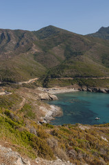 Fototapeta na wymiar Corsica, 28/08/2017: vista panoramica dell'Anse d'Aliso o Plage d'Alisu, una delle spiagge più remote del versante occidentale di Capo Corso