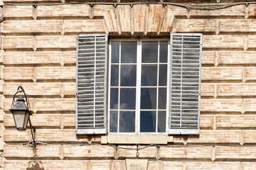 Gubbio, Perugia, Italy -  Piazza Grande, in Gubbio, architectural details of the ancient palaces