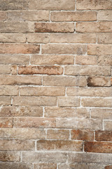 Gubbio, Perugia, Italy -   ancient wall in a small typical street of the Gubbio village.