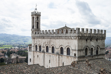 Fototapeta na wymiar Gubbio, Perugia, Italy - view from above of Palazzo dei Consoli. The palace is located in Piazza Grande, in Gubbio, and is one of the most impressive public buildings in Italy.