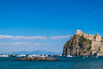 A summer day visiting Aragonese Castle and looking toward Capri and Vesuvi Ischia Ponte, Ischia, Phlegrean Islands, Tyrrhenian Sea, Italy, South Europe