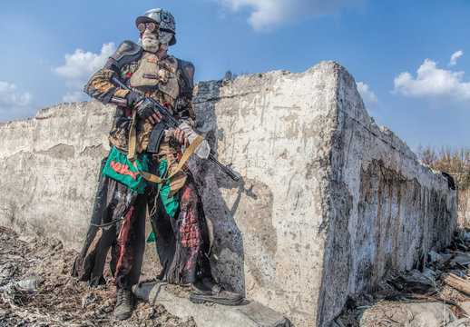 Post apocalyptic survivor creature with homemade weapons