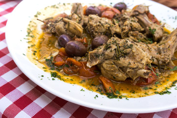 juicy grilled pork leg with fresh vegetables