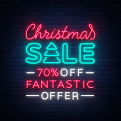 Fototapeta na wymiar Christmas sale card template in neon style, isolated vector illustration. Bright advertising of Christmas discounts for shops. Holiday discounts sale, broochure, glowing neon sign