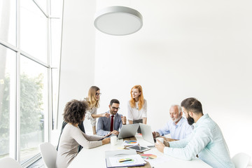 Multiracial young business people working in office