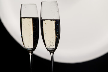 two champagne glasses ready to bring in the New Year