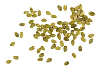 Pumpkin seeds isolated on white background, top view