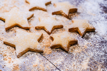 Christmas cookies  stars on wooden background