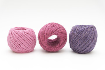 colored yarn thread isolated on white background