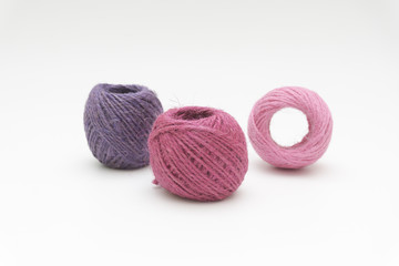 colored yarn thread isolated on white background