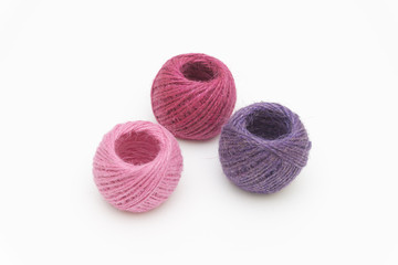 colored yarn thread isolated on white background