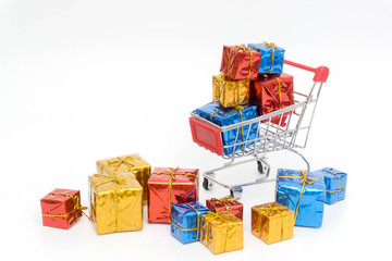 set colorful gift boxes with trolley on white background