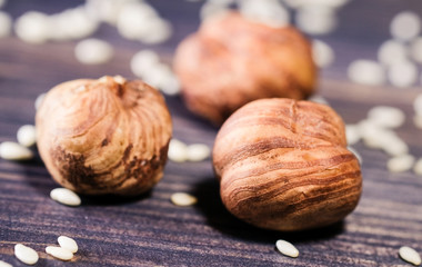 Cores of a huzelnut with seeds of sesame