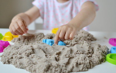Little Girl Playing with Kinetic Sand at Home Early Education Preparing for School Development, Children Game