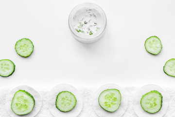 Cucumber moisturising cream or mask pattern. White background top view copyspace