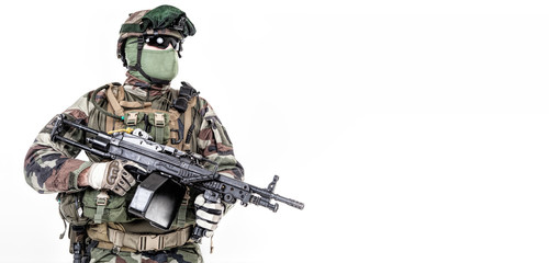 Paratrooper of french 1st Marine Infantry Parachute Regiment RPIMA studio shot firing pointing weapons