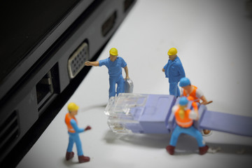 Selective focus of miniature engineer and worker fixed chip and  mainboard computer and use for...
