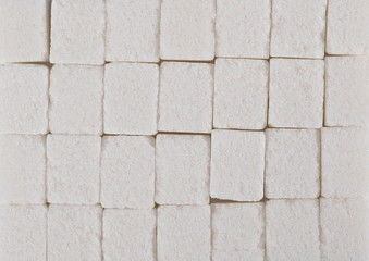White sugar cubes background and texture