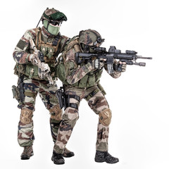 Paratroopers of french 1st Marine Infantry Parachute Regiment RPIMA studio shot firing pointing weapons