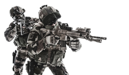 Paratroopers of french 1st Marine Infantry Parachute Regiment RPIMA studio shot firing pointing weapons