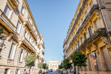 Fototapeta na wymiar Street view with beautiful old luxurois buildings on the Foch boulevard during the morning light in Montpellier city in Occitanie region of France