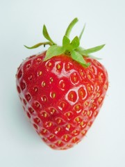 Fresh, juicy strawberry on a white background