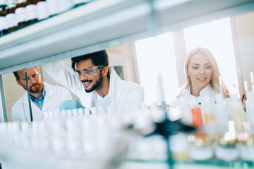 Group of chemistry students working in laboratory