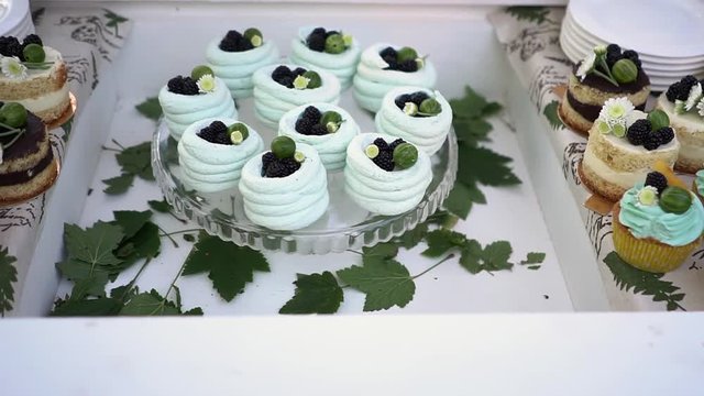 Cute candy bar with various cakes.