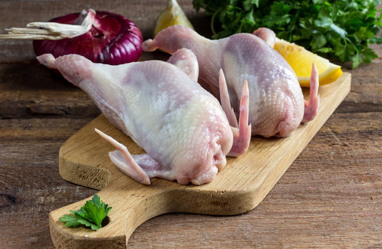 Raw uncooked quail meat