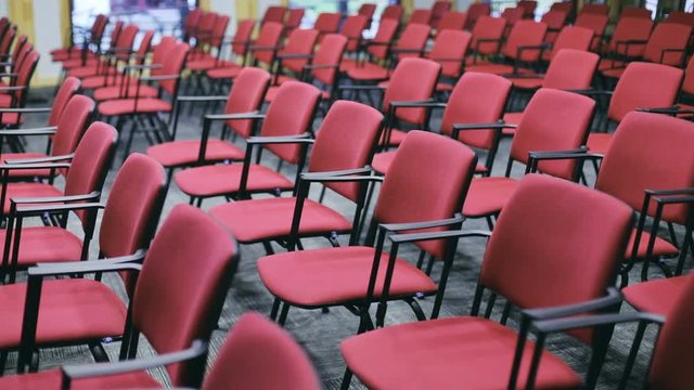 conference hall studio cinema theater empty red seats chairs stools seating place audience listeners inside nobody public place seminar lecture university seating sitting space modern auditorium